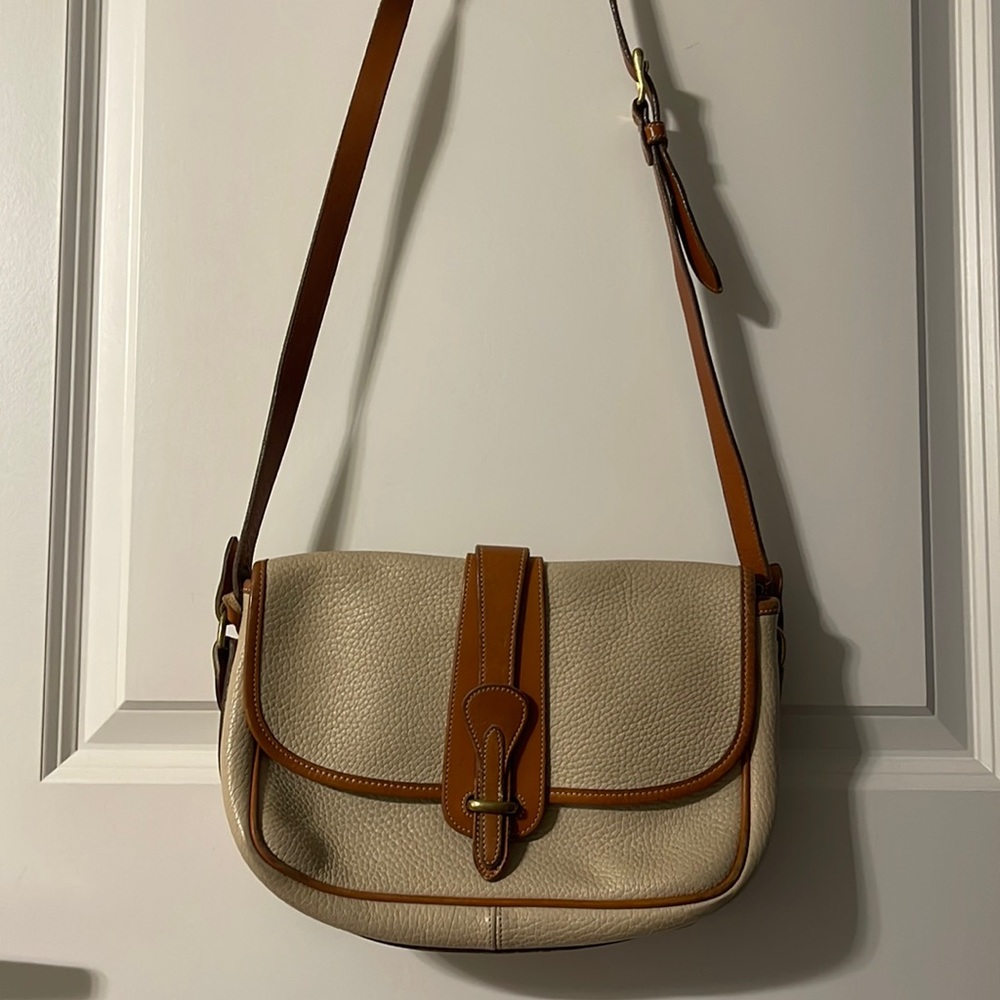 Vintage Dooney and Bourke leather purse with matching wallet